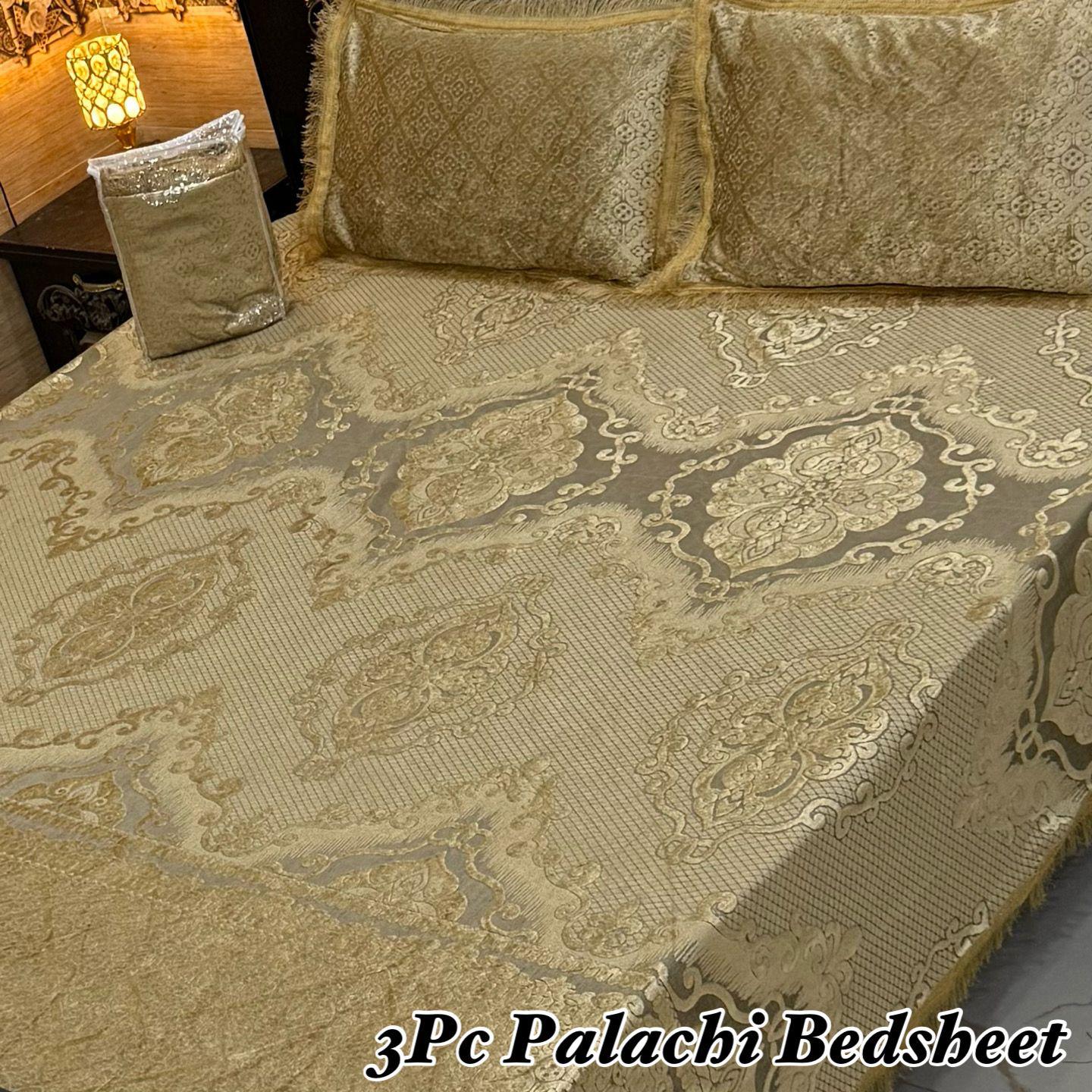 3-piece Palachi bedsheet set with intricate patterns on a bed.