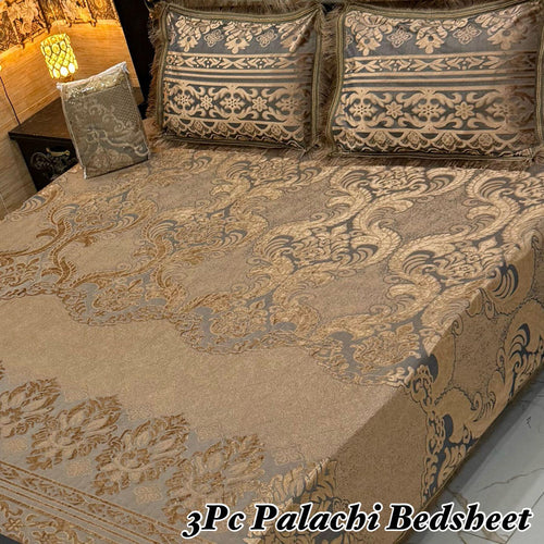 Decorative bedspread with intricate patterns on a bed, featuring the brand '3Pc Palachi Bedsheet'.