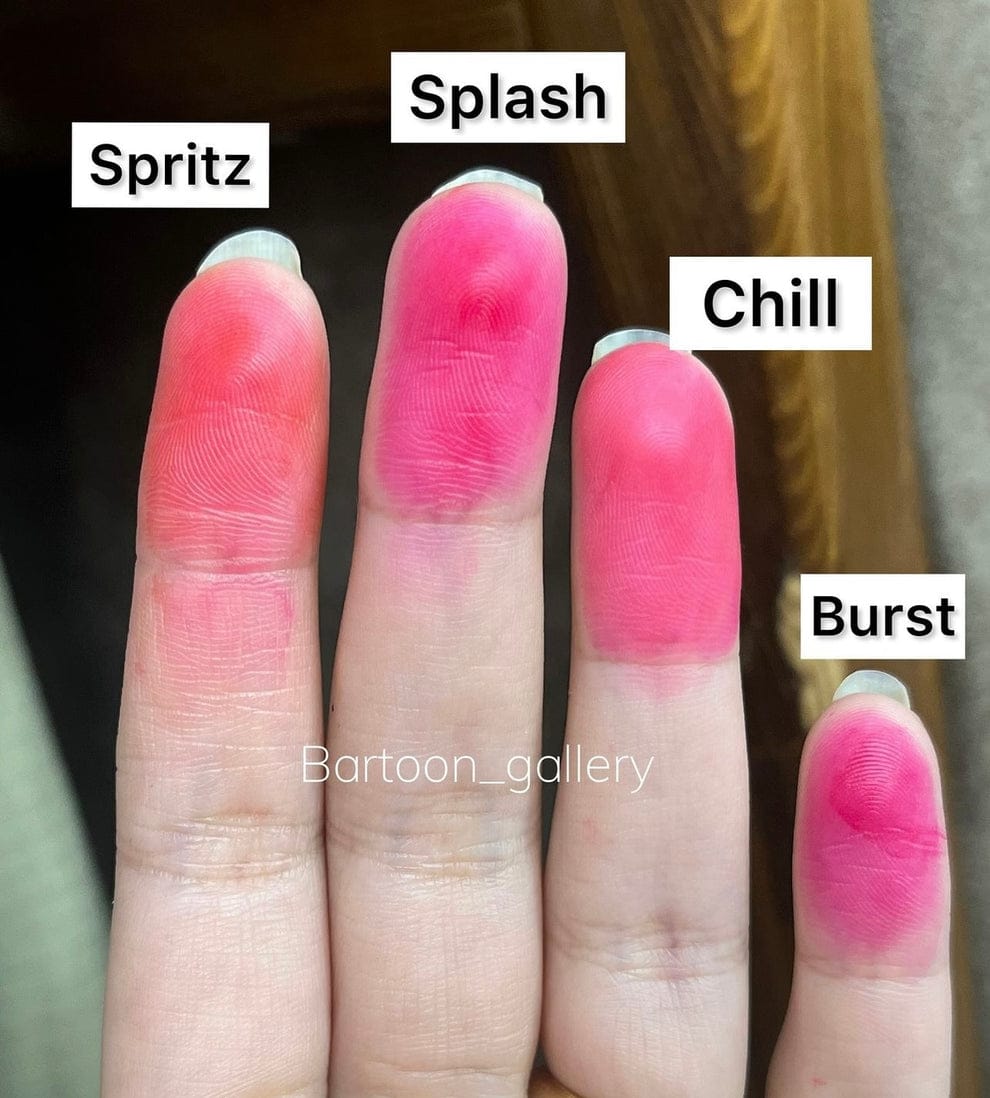 Fingers with pink nail polish swatches labeled 'Spritz', 'Splash', 'Chill', and 'Burst'.