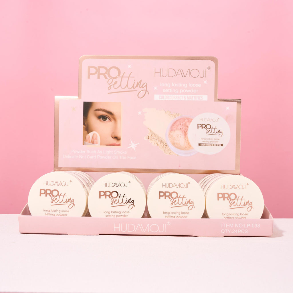 Hudavioji Pro Setting powder set on a pink background